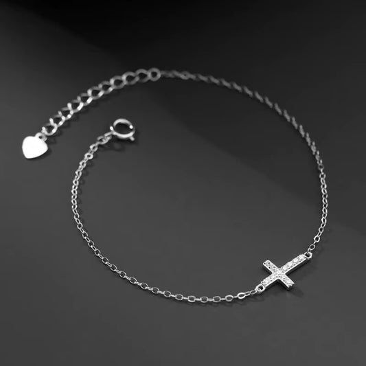 dainty Silver bracelet with a cross charm