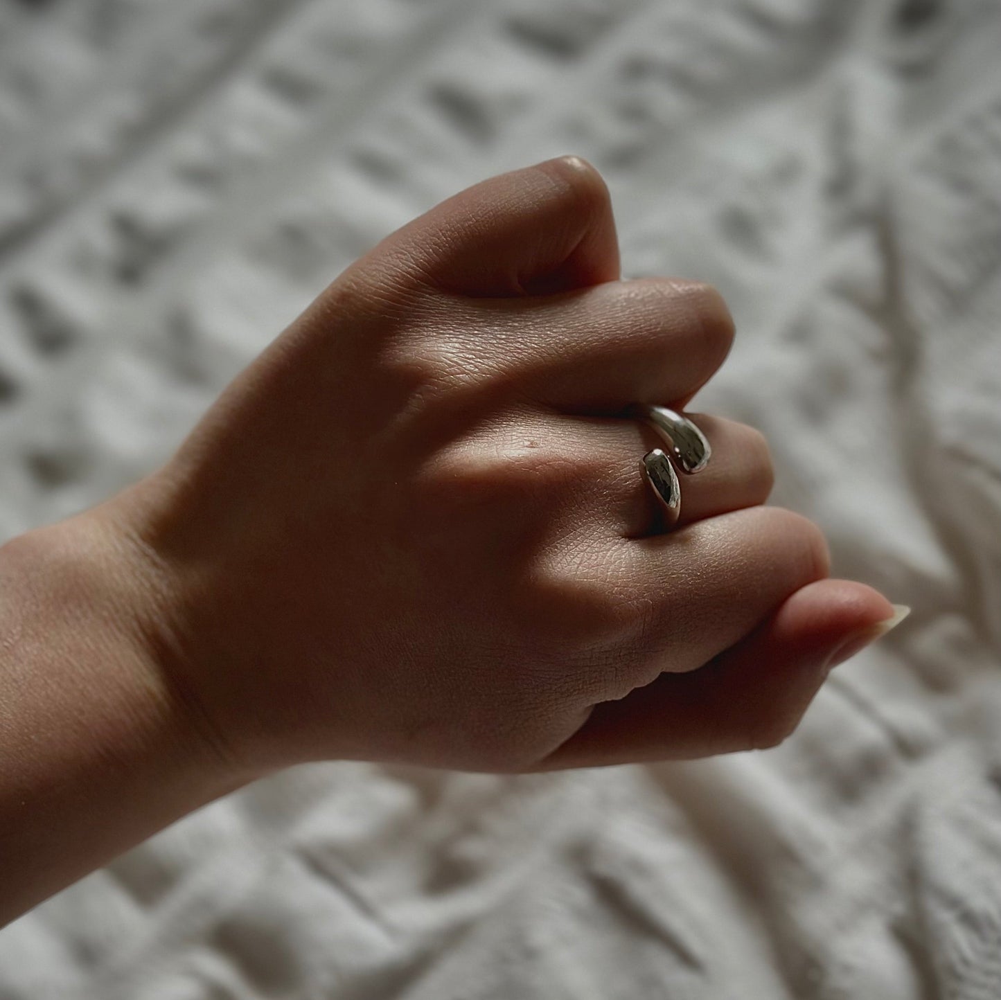 Gia resizeable ring on finger