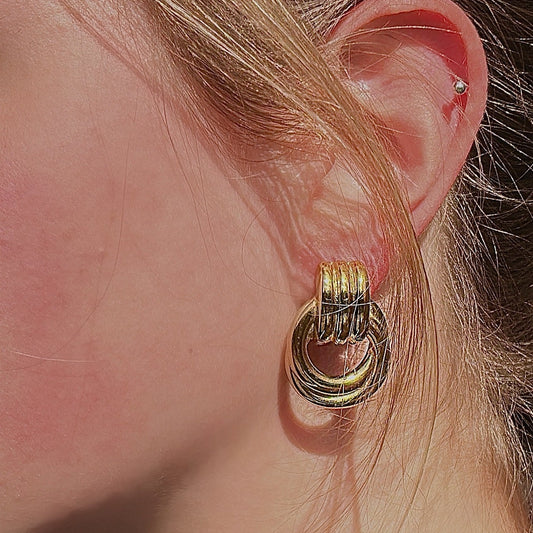 textured earring on model