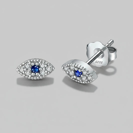 Silver earrings with blue gemstones on a white background, featuring 'Real Sterling Silver'.