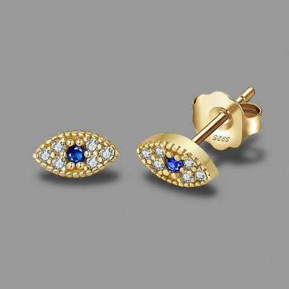 Gold earrings with blue eye